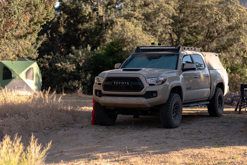 Lifted Quicksand 3rd Gen Tacoma with Softopper Truck Top