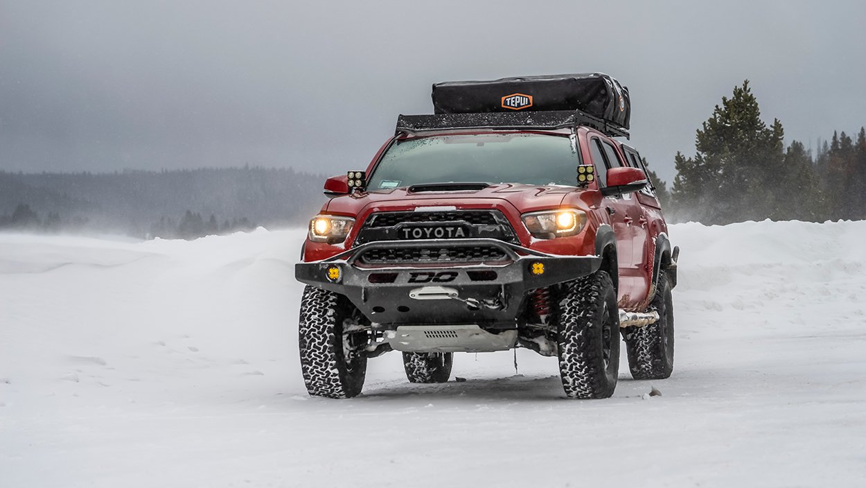 Lifted 3rd Gen Tacoma with BFG KO2 Tires and Snugtop Truck Cap