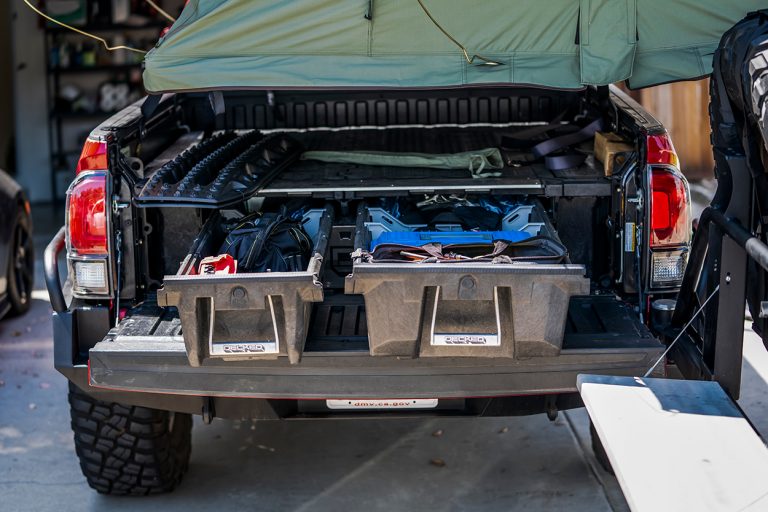 Camper Shells Vs. Bed Racks - Which Is Best For Your Tacoma?