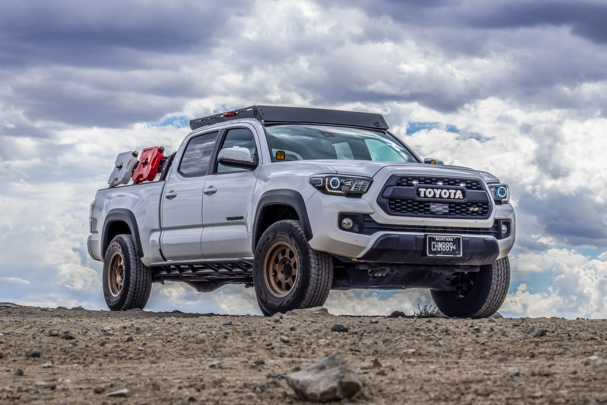 Super White 3rd Gen Tacoma with AL Offroad Roof Rack, Rago Fabrication Rock Sliders & Method Wheels