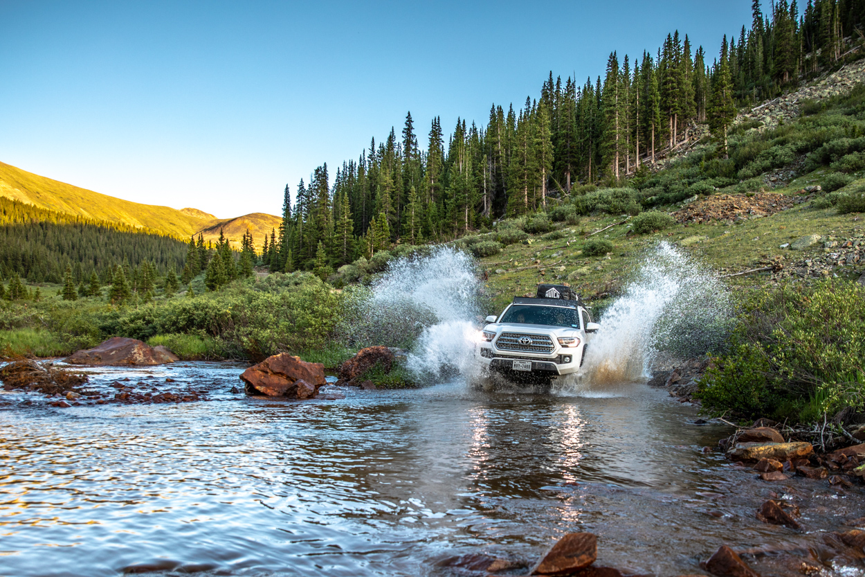 3rd Gen Tacoma Water Crossing at Sunset on Red Cone Pass