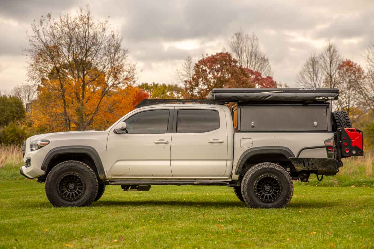 Lifted 3rd Gen Tacoma with AluCab Explorer Canopy, RRW RR6H & DOM Bolt-On Rock Sliders
