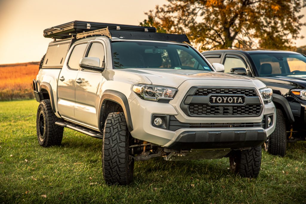 Lifted Super White 3rd Gen Tacoma with 34" Toyo Open Country R/T Tires