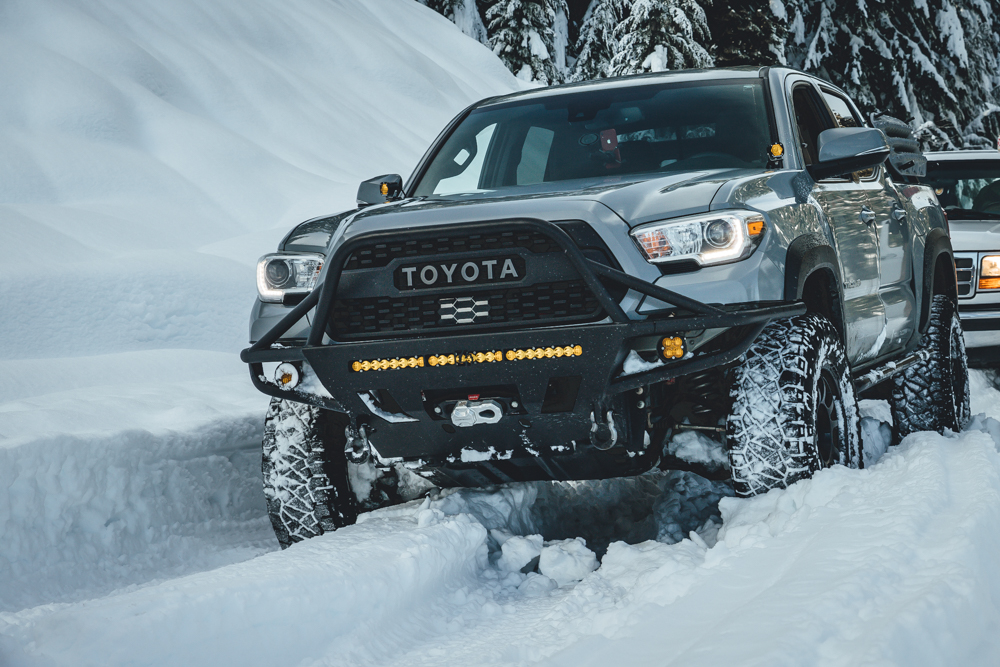 Lifted Cement 3rd Gen Tacoma with C4 Hybrid Front Bumper with Agency 6 Winch Shackle