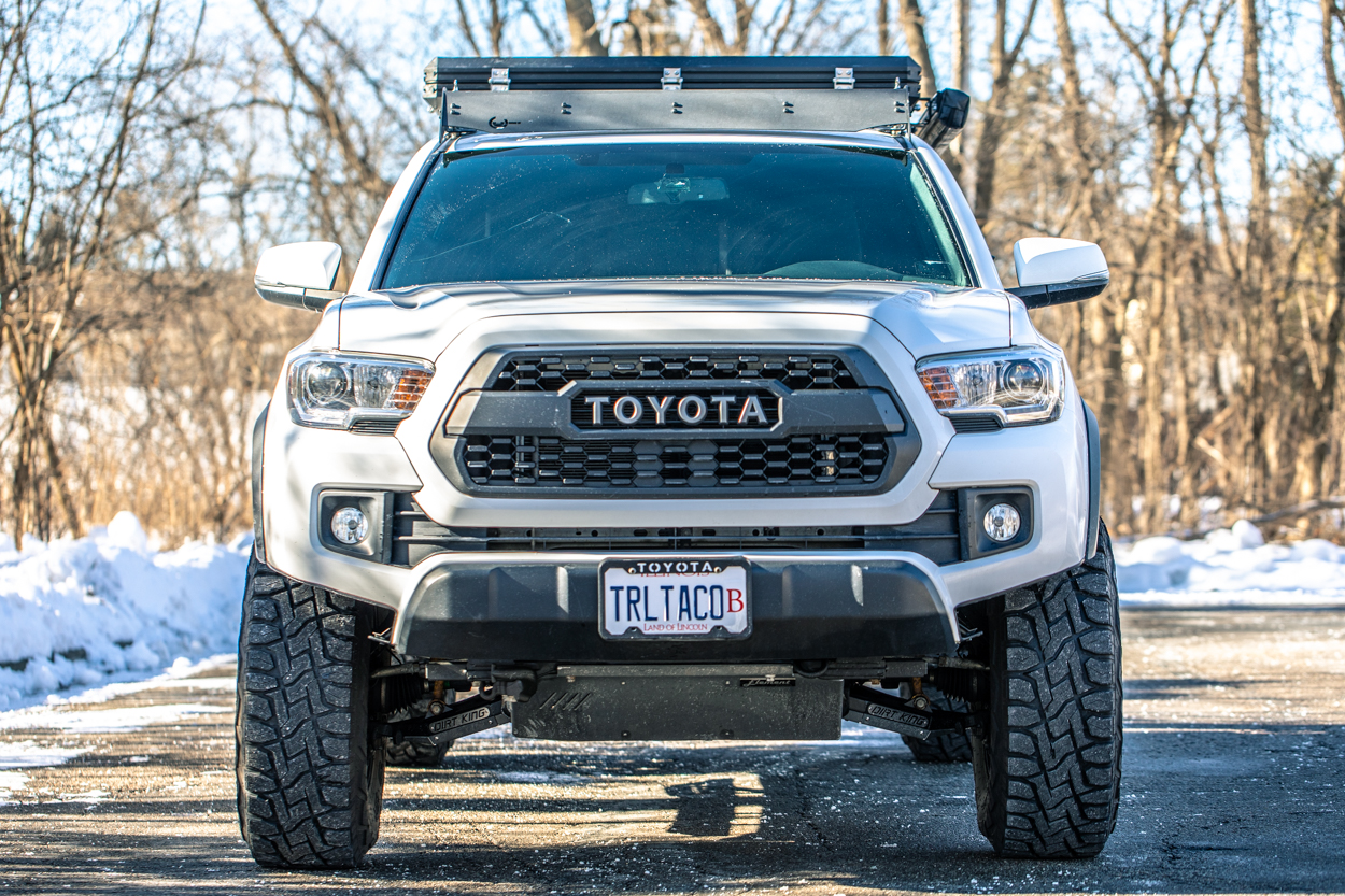 TRD Pro Style Grille Installed on Lifted White 3rd Gen Tacoma Overland Build with Viper Cut