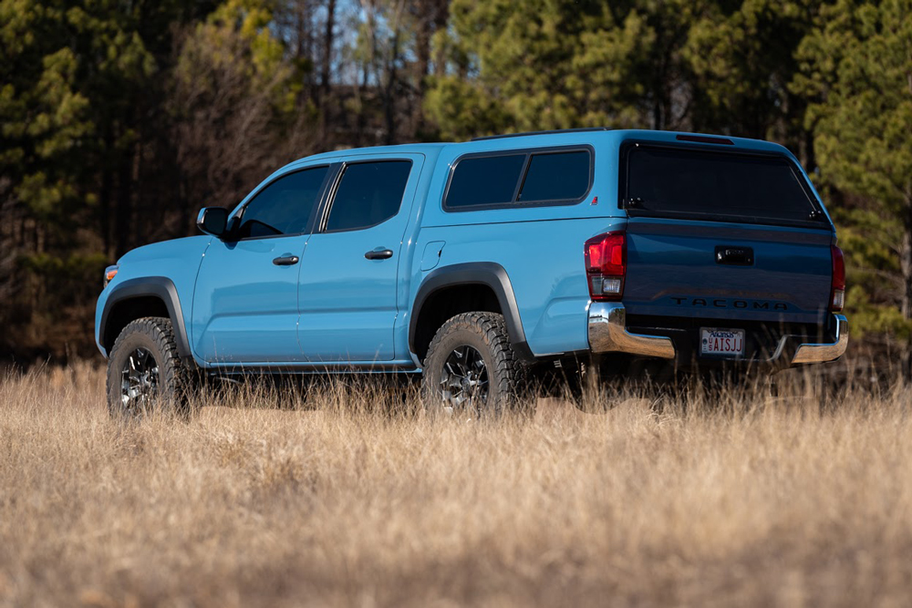 Cavalry Blue Double Cab Short Bed 3rd Gen Toyota Tacoma with Leer 100R Camper Shell