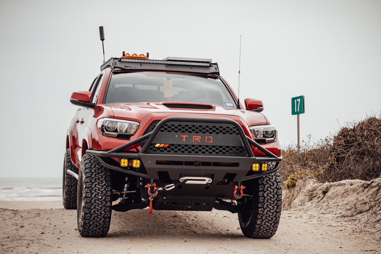 Lifted Barcelona Red Metallic 3rd Gen Tacoma with BFG AT Tires, C4 Fabrication Front Bumper, Prinsu Roof Rack & USR Replica TRD Pro Headlights