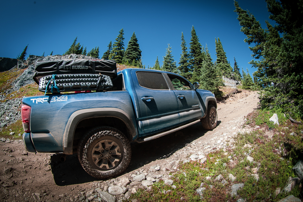 Lifted Calvary Blue 3rd Gen Tacoma with Bed Rack & Rooftop Tent on Whipsaw Creek Trail