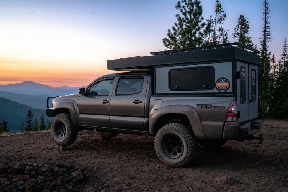 Lifted 2nd Gen Tacoma with Hower Built Electric Base Camp Camper