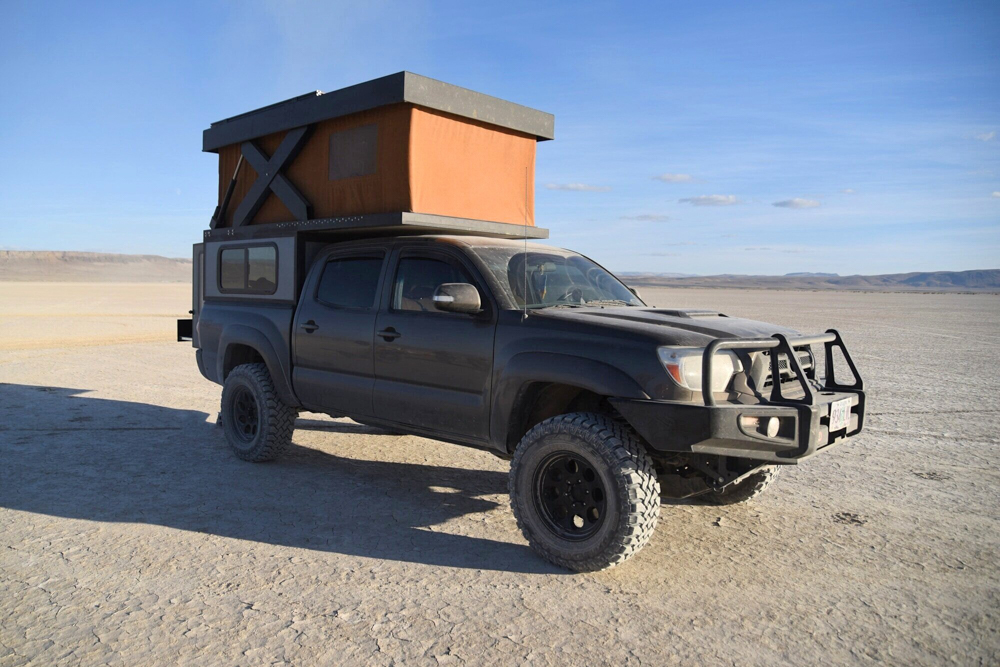 Lifted 2nd Gen Tacoma with ARB Front Bumper & Hower Built Base Camp Camper