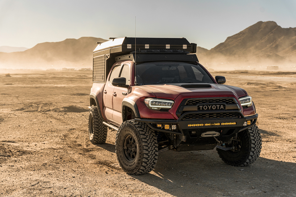 Long Travel TRD Pro 3rd Gen Tacoma with Baja Designs LED Lights & AluCab Canopy Camper