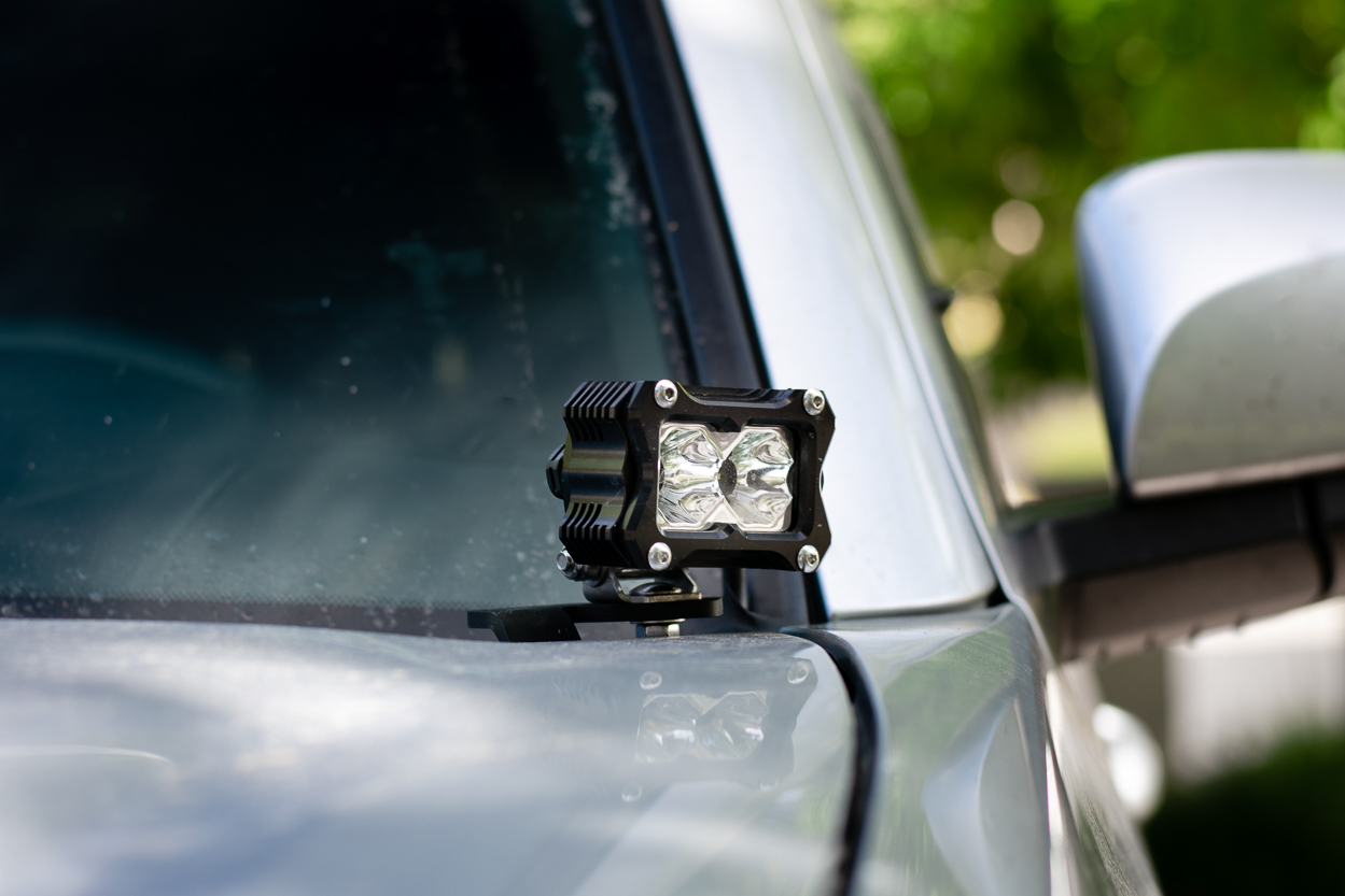 Heretic Studio BA-2 LED Pods Mounted on Cali Raised Ditch Light Bracket on 3rd Gen Tacoma