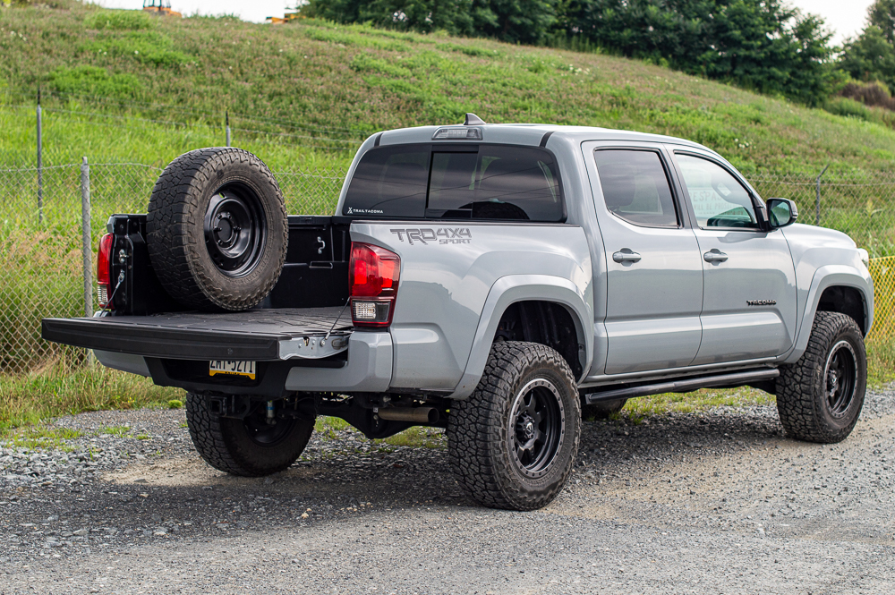 Cement 3rd Gen Tacoma with Fuel Wheels & Mobtown Rock Sliders