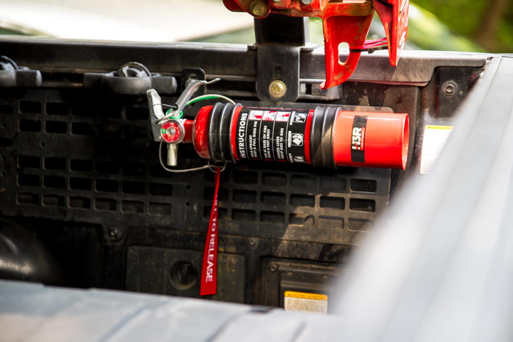 H3R Performance MaxOut Fire Extinguisher Mounted on Tacoma Truck Bed Molle Panel