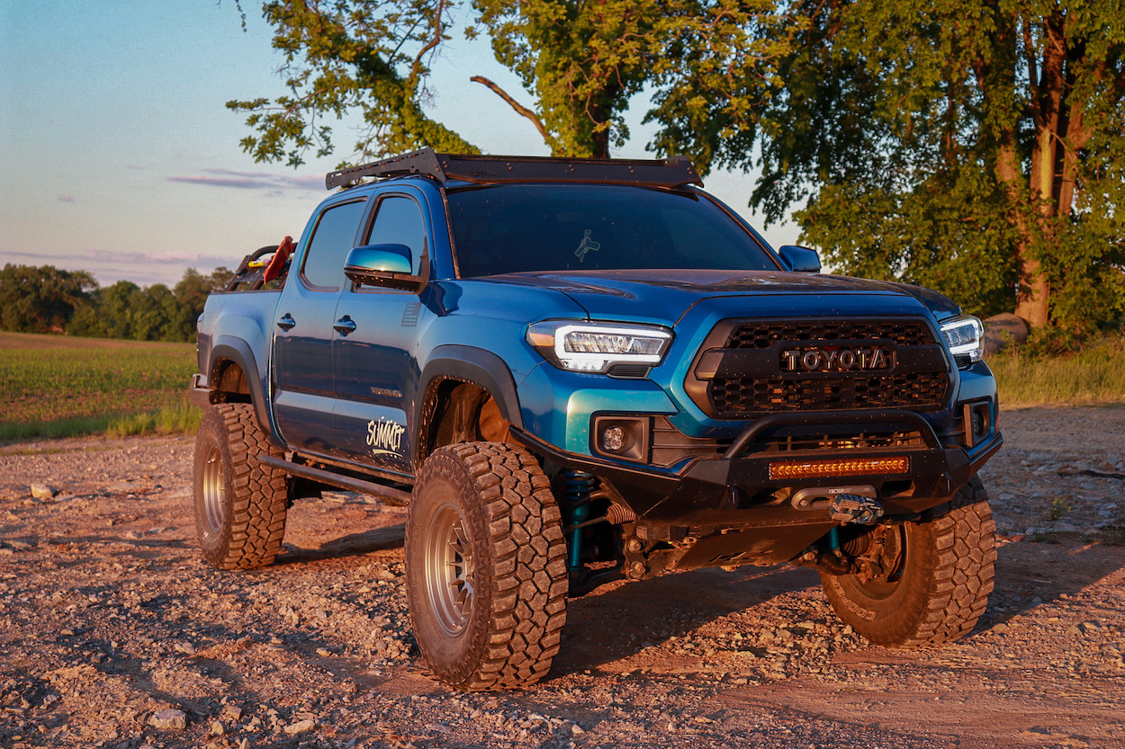 Blazing Blue Pearl Tacoma with SSO High-Clearance Slimline Bumper, Prinsu Roof Rack & AlphaRex TRD Replica Headlights