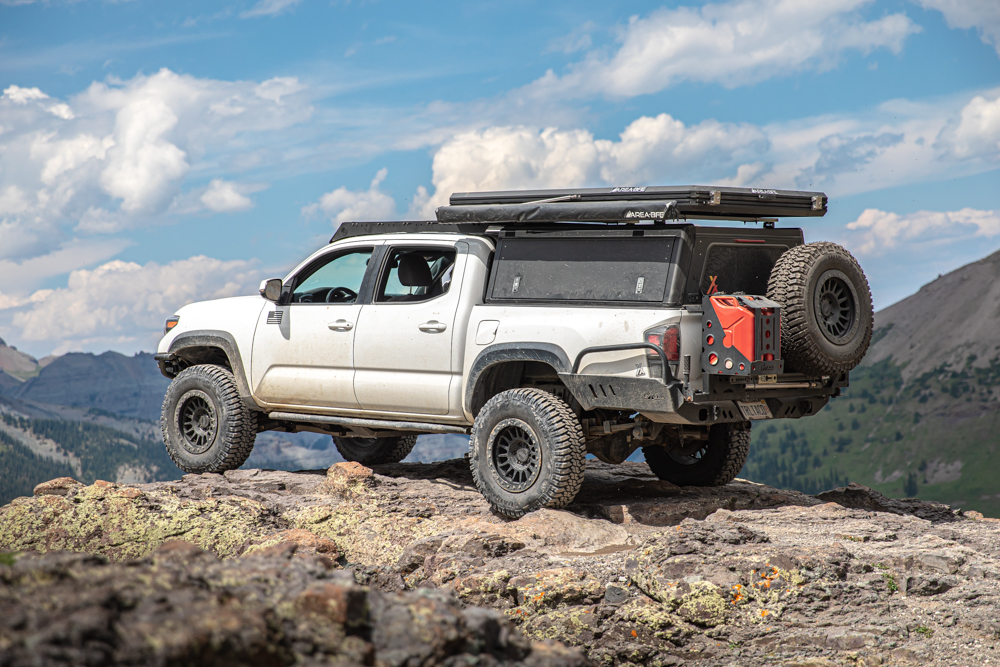 Lifted 3rd Gen Tacoma with AluCab Explorer Canopy & AreaBFE Rooftop Tent