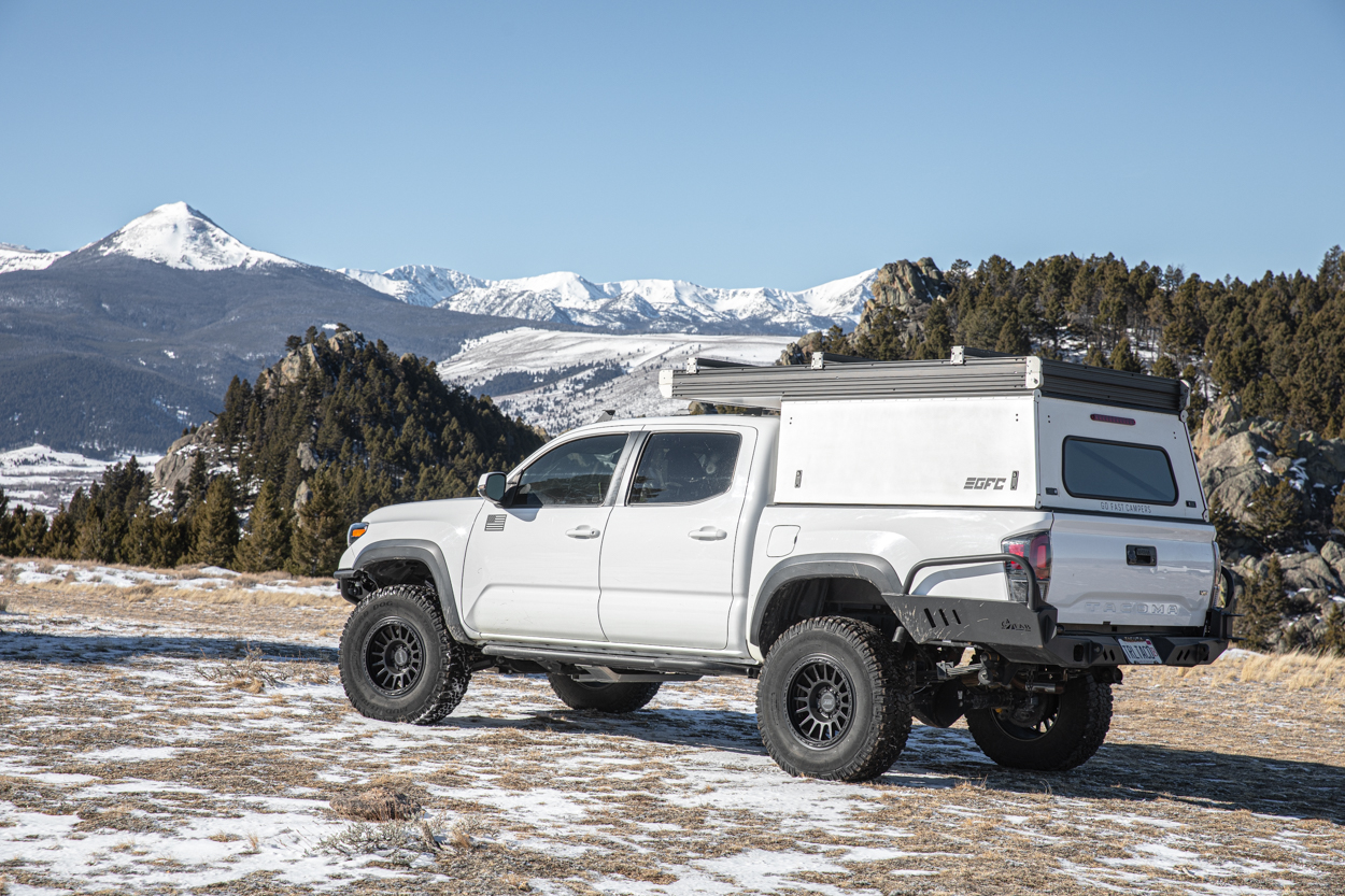 White 3rd Gen Tacoma With White GFC Camper & TreadWright Guard Dog Tires