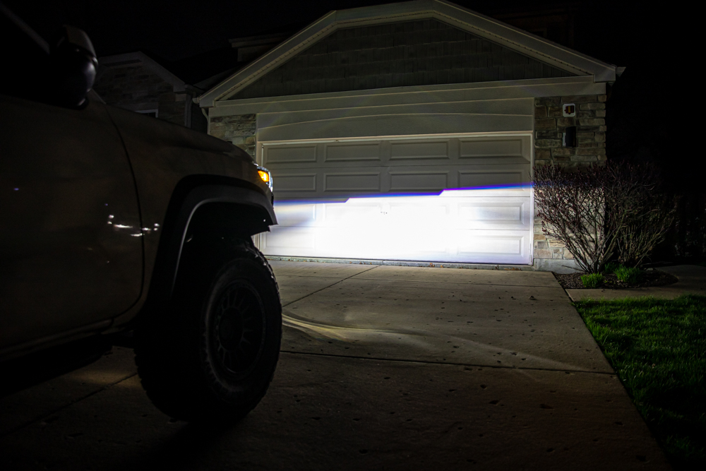 Garage Door Shot - Tacoma AlphaRex NOVA LED Projector Headlight Output