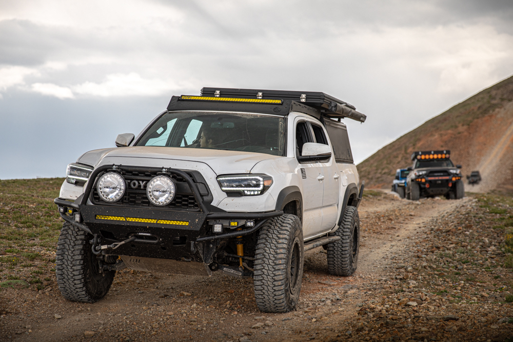 Lifted Super White 3rd Gen Tacoma with TreadWright Guard Dog Tires & Lightforce LED Lights