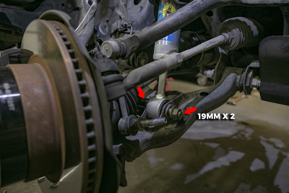 Remove 19mm Lower Shock Bolt