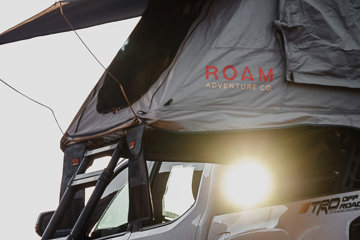 Roam Adventure Co Vagabond Rooftop Tent Lite Mounted on Tacoma Bed Rack