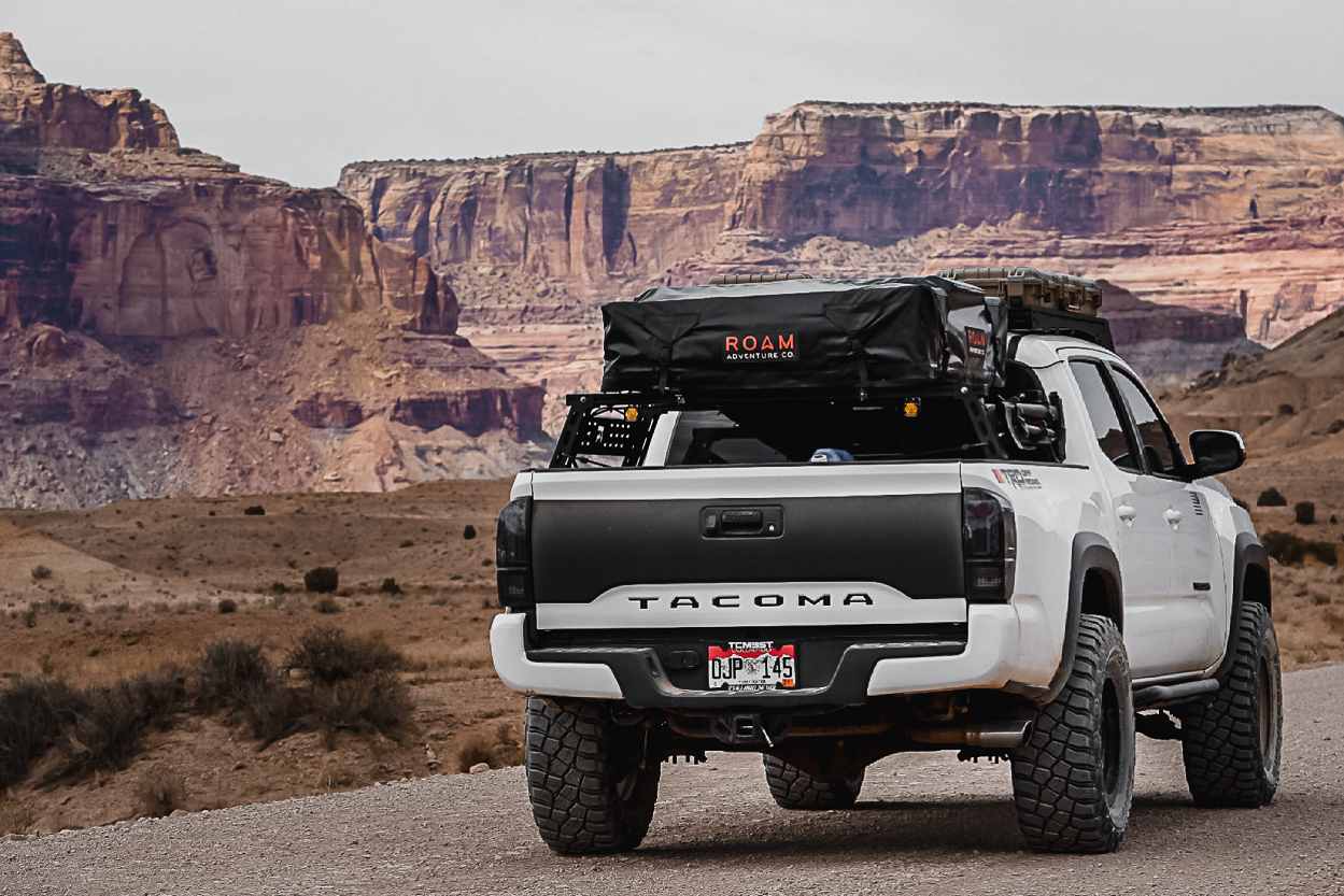 Lifted 3rd Gen Tacoma with RTT Mounted on Bed Rack & Tailgate Vinyl Stamp/Inlay