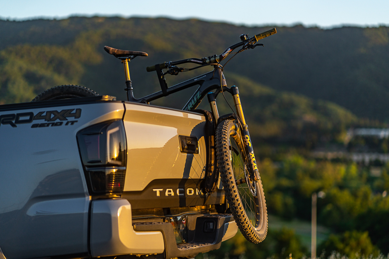 Loading Mountain Bikes onto Bomber Strap Tailgate Bike Carrier