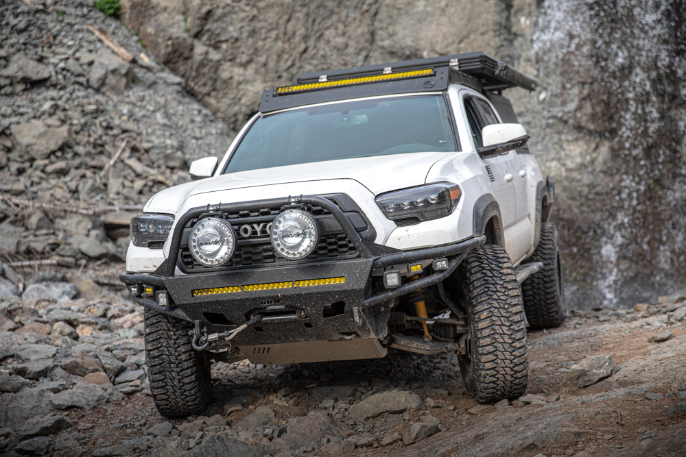 Lifted Super White 3rd Gen Tacoma with RRW Hybrid Front Bumper, Lightforce LED Lights, AlphaRex Headlights & AL Off-Road Roof Rack