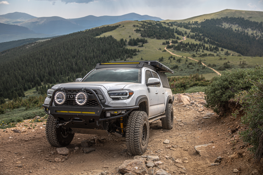 Lifted Super White 3rd Gen Tacoma with TreadWright 33s, RRW Armor & Wheels