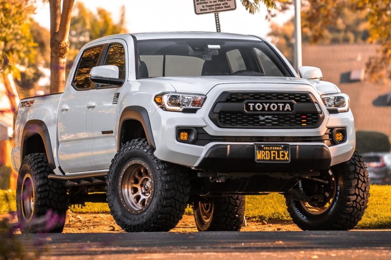 Super White Toyota Tacoma TRD Off-Road with SCS Wheels & Cooper STT Pro Tires