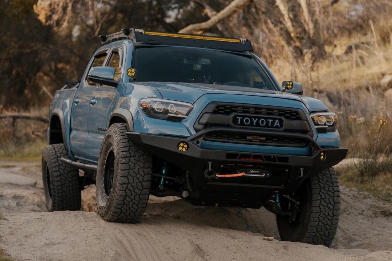 Cavalry Blue 3rd Gen Tacoma with CBI Off-Road Fabrication Baja Bumper, Prinsu Rack & Dark Defense LED Lights