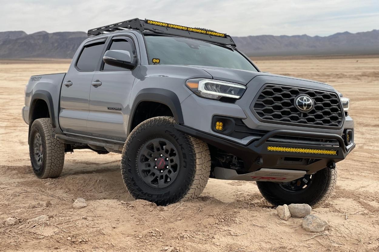 Lifted Cement 3rd Gen Tacoma with SSO Front Bumper, Prinsu Roof Rack & Baja Designs LED Lights