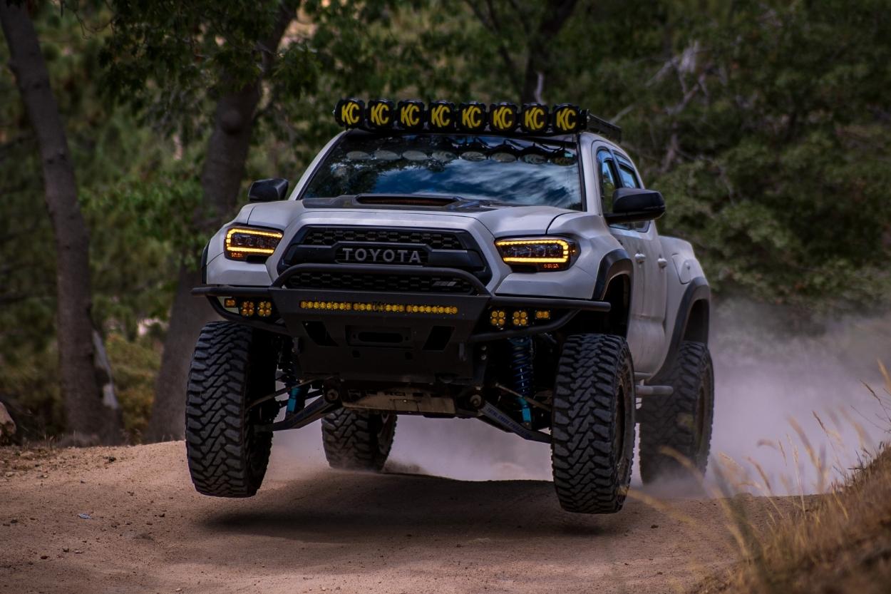 White TRD Pro Tacoma, Kings Long Travel Suspension, KC HiLiTES, Total Chaos