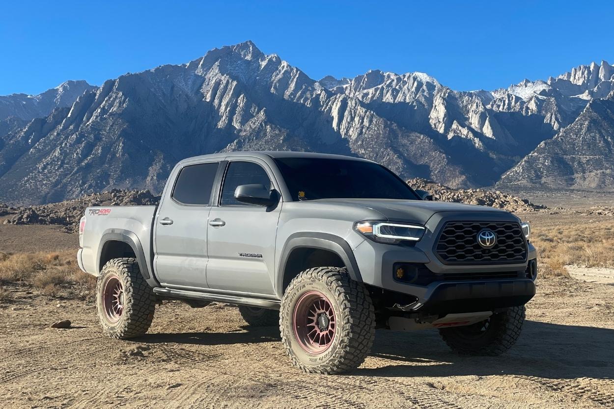 Lifted Cement 3rd Gen Tacoma with Illusion Cherry Summit Dakar Wheels & BFG KM3 Tires