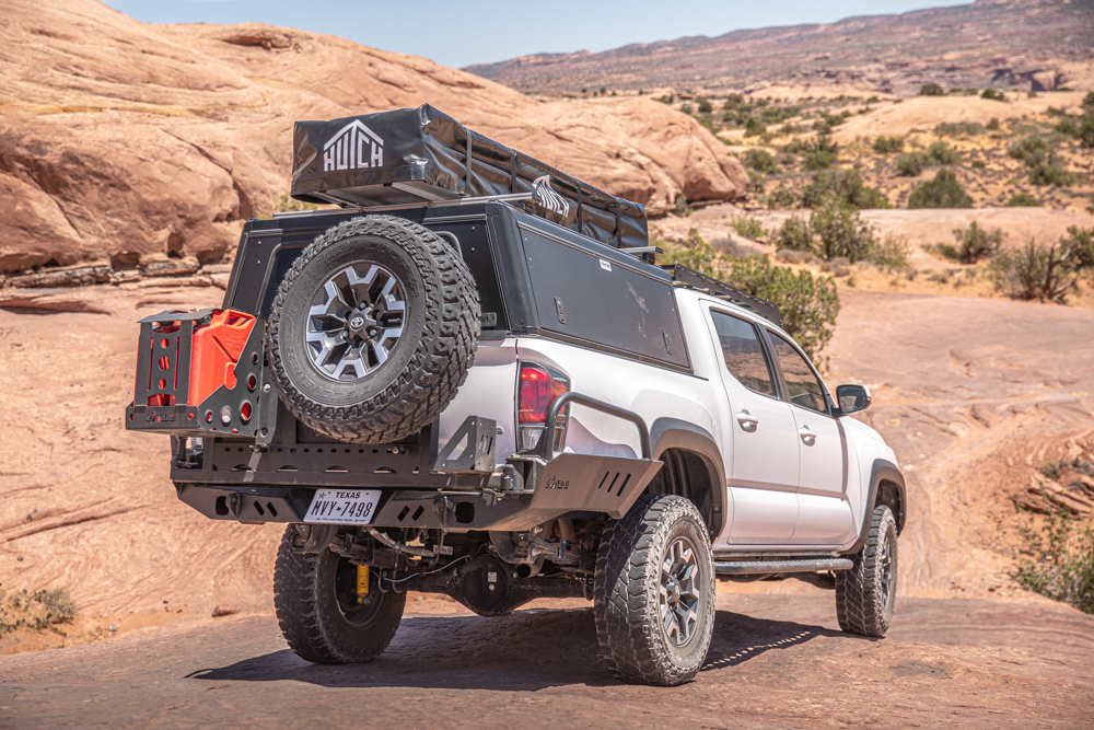 ARB OME (Old Man Emu) Heavy Leaf Springs Installed on White 3rd Gen Tacoma Overland Build with Camper