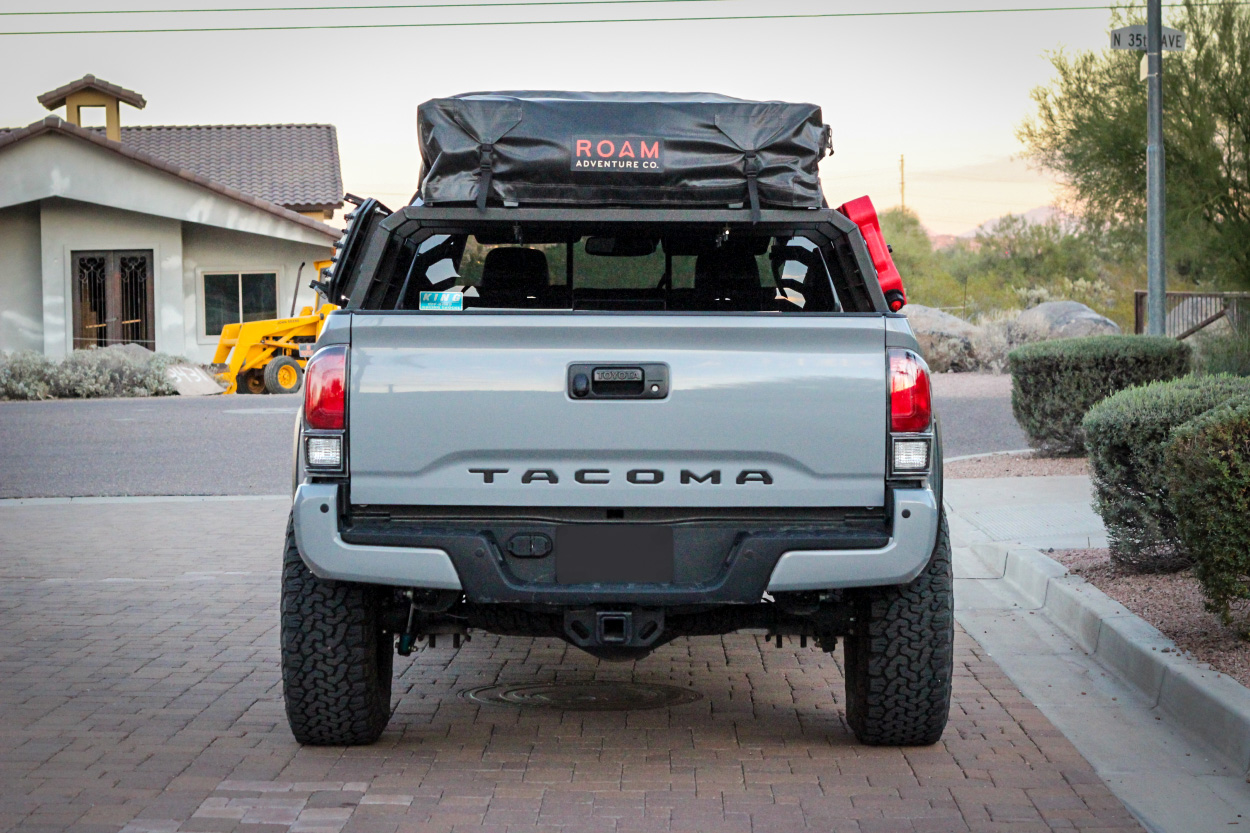 Cement 3rd Gen Tacoma with Bed Rack & Roam Rooftop Tent