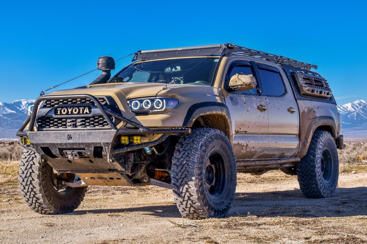 Quicksand 3rd Gen Tacoma with Total Chaos Long Travel Suspension, C4 Fabrication Front Bumper, Custom Retrofit Headlights & Prinsu Roof Rack