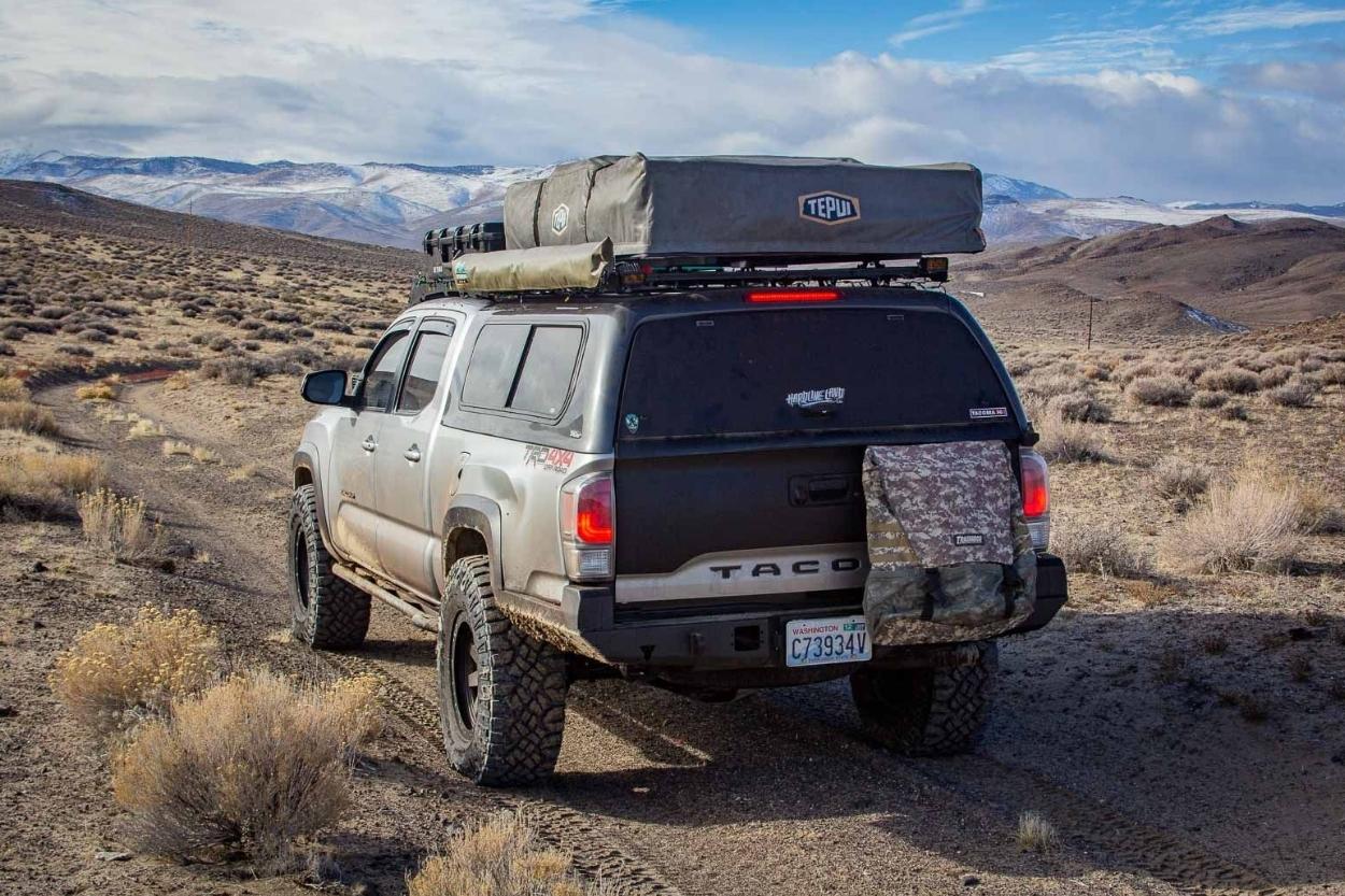 Lifted 3rd Gen Tacoma with ATH Fab High Clearance Rear Bumper & Tepui RTT