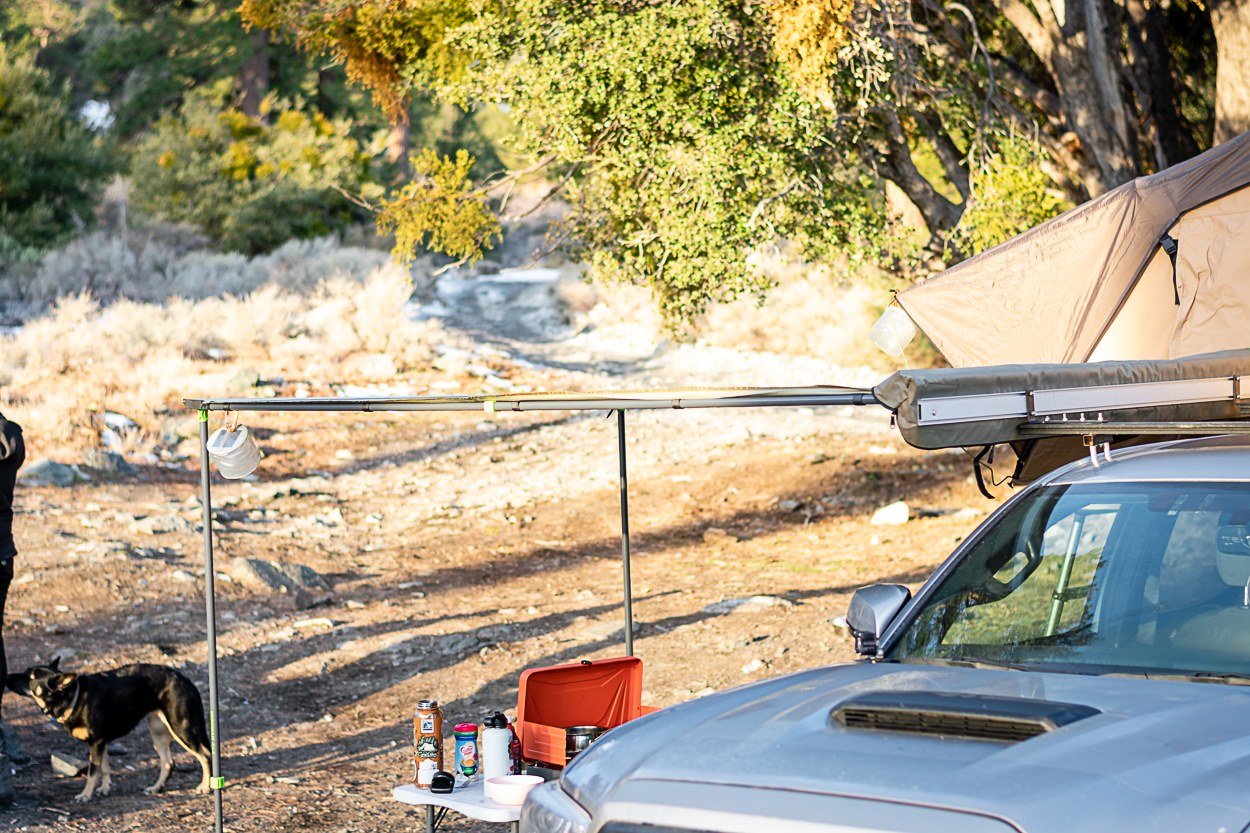 Ironman 4x4 6.5 foot overhead camping awning mounted to homemade roof rack 3rd gen Tacoma