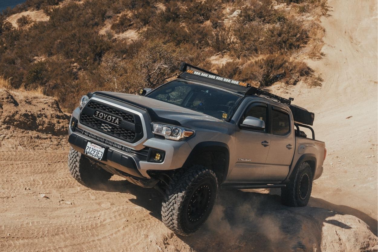 Lifted 3rd Gen Tacoma with High Clearance Front Bumper Viper Cut, Prinsu Roof Rack & Yokohama Geolandar MT Tires