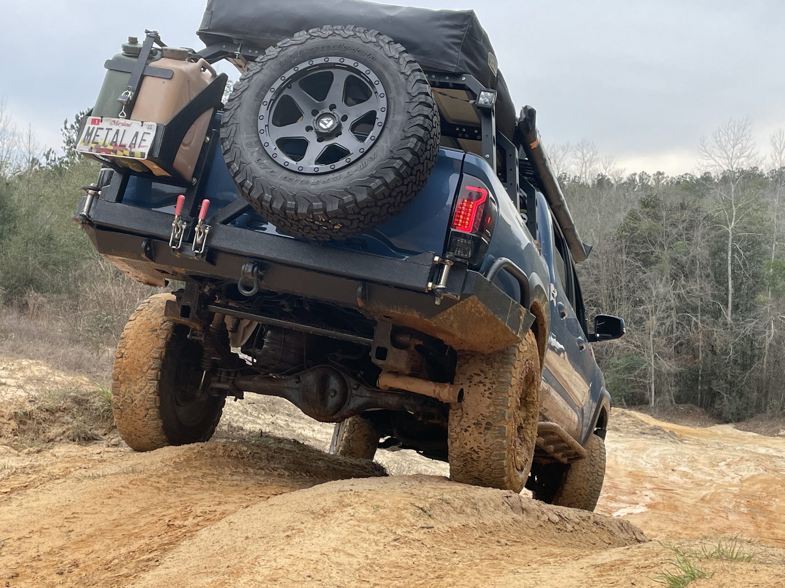 Cavalry Blue Toyota Tacoma with BAMF HD Hangers & Cross Member & Off-Road Rear Bumper