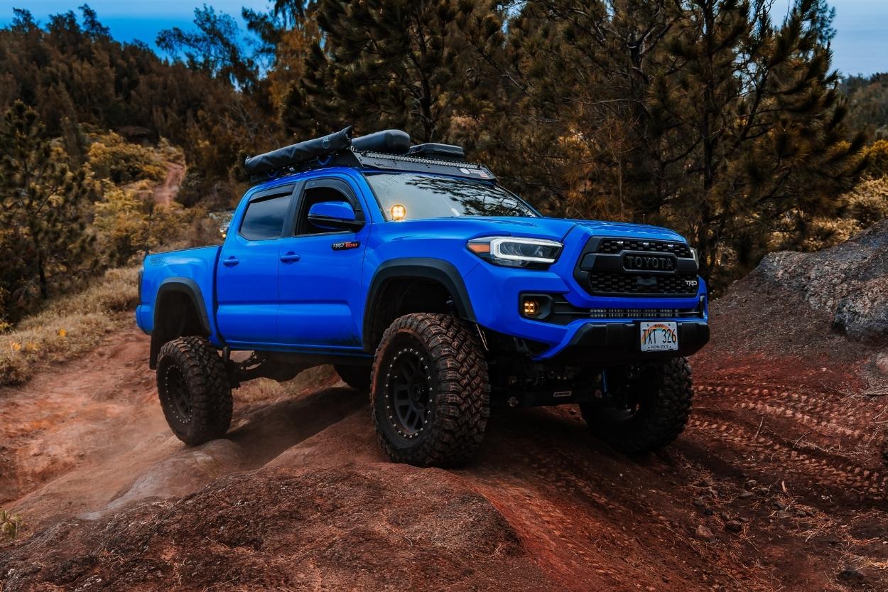 voodoo blue tacoma Kings 2.5 with reservoirs Falken Wildpeak MT 35X12.50 Methods 306 18x9-12