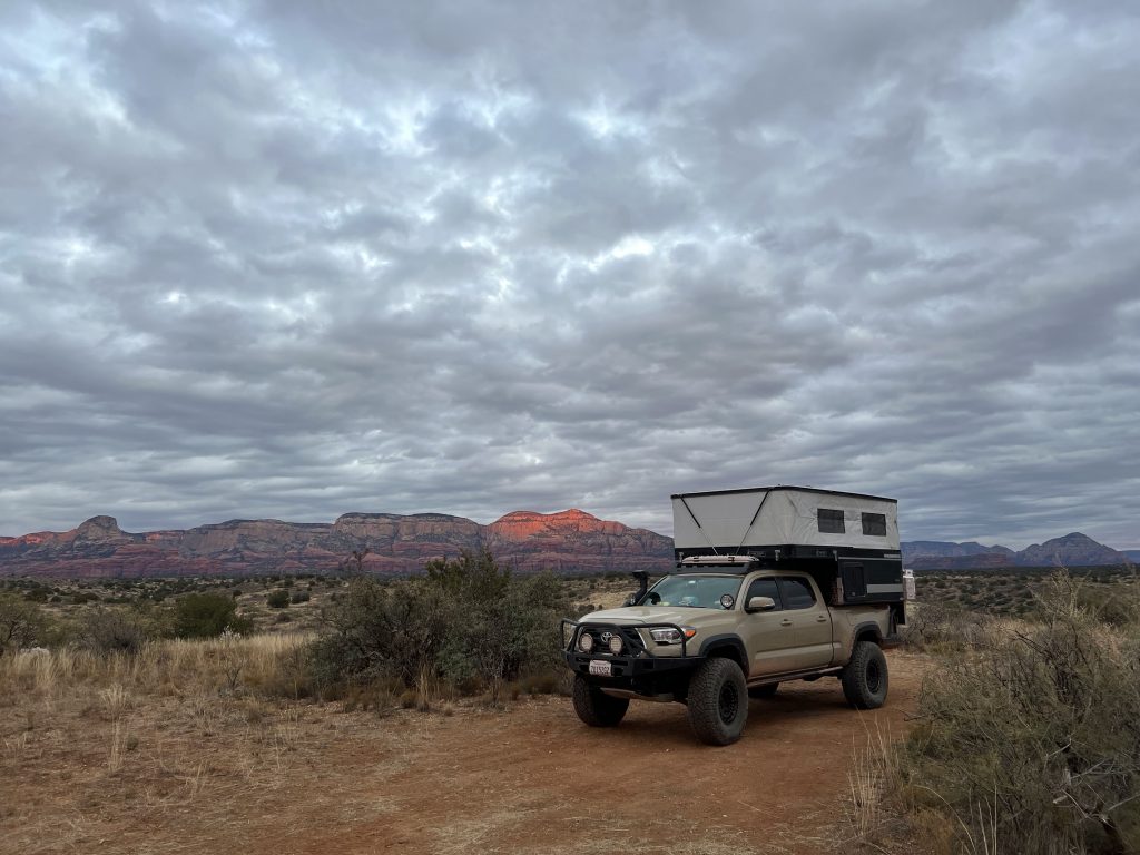 Four Wheel Campers Fleet Model Slide-In Camper on 3rd Gen Toyota Tacoma