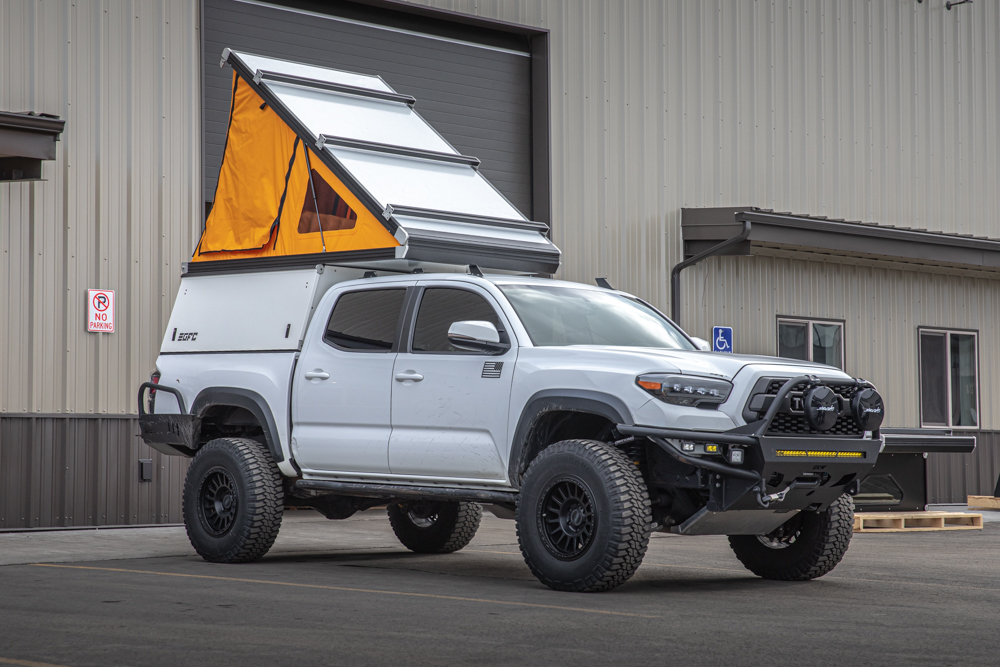 White GFC with Tangerine Dream Tent Material & Beef Rack Crossbars on White Tacoma