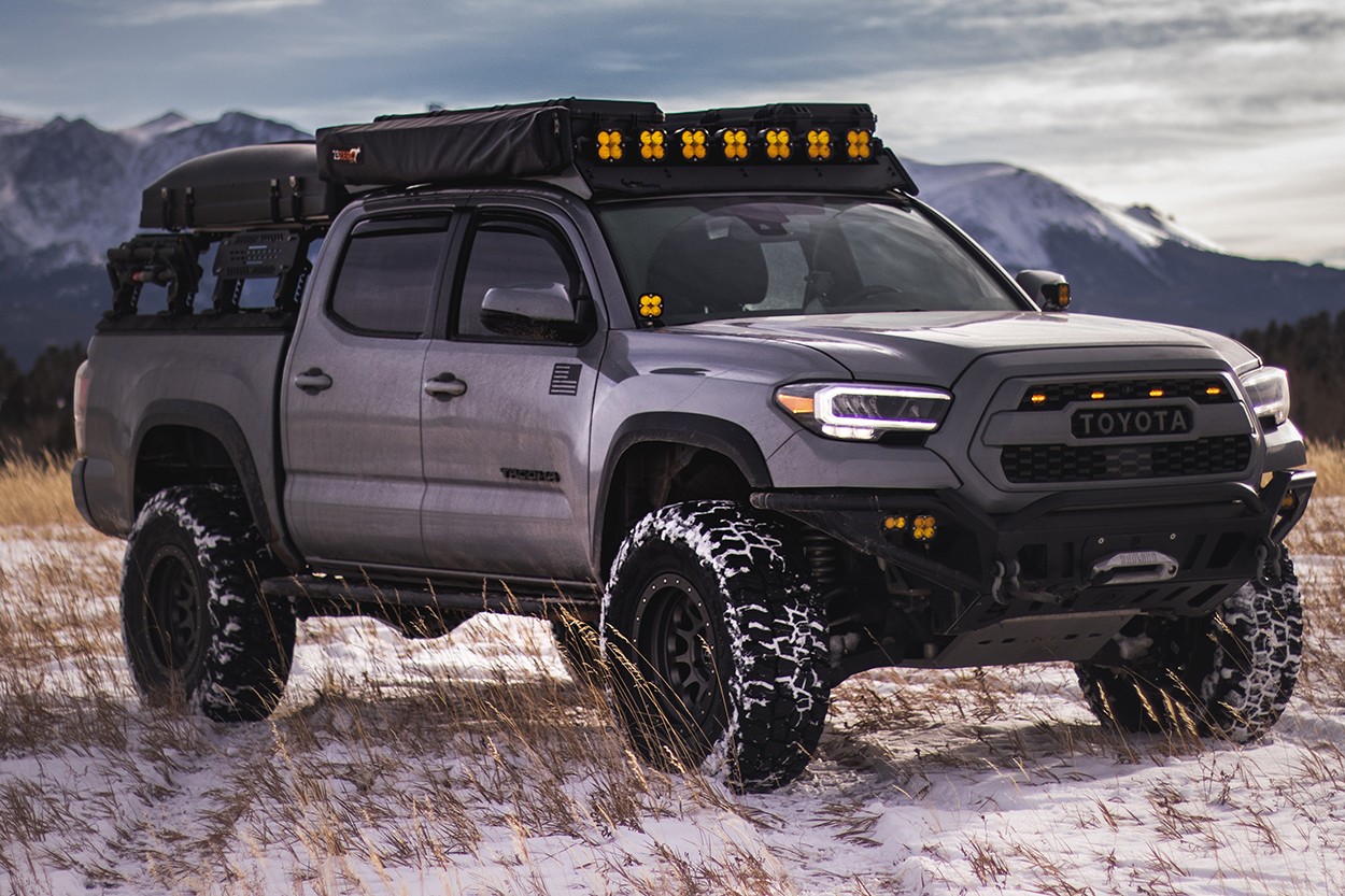 Cement Grey Tacoma with Baja Designs Squadron Sport & Lil B's Fabrication Front Bumper