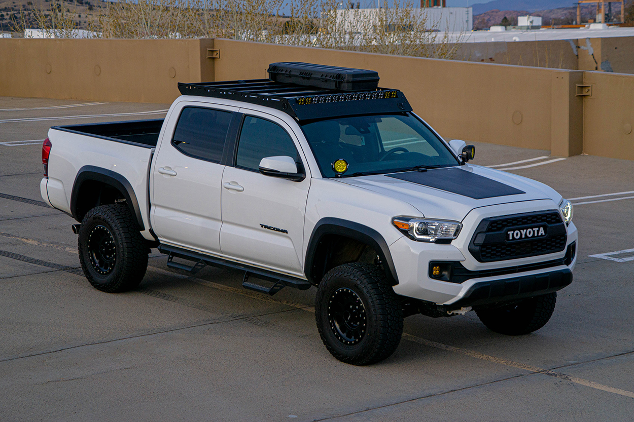 Lifted Super White Tacoma with VisionX 4.7" CG2 Tacoma Ditch Light Kit