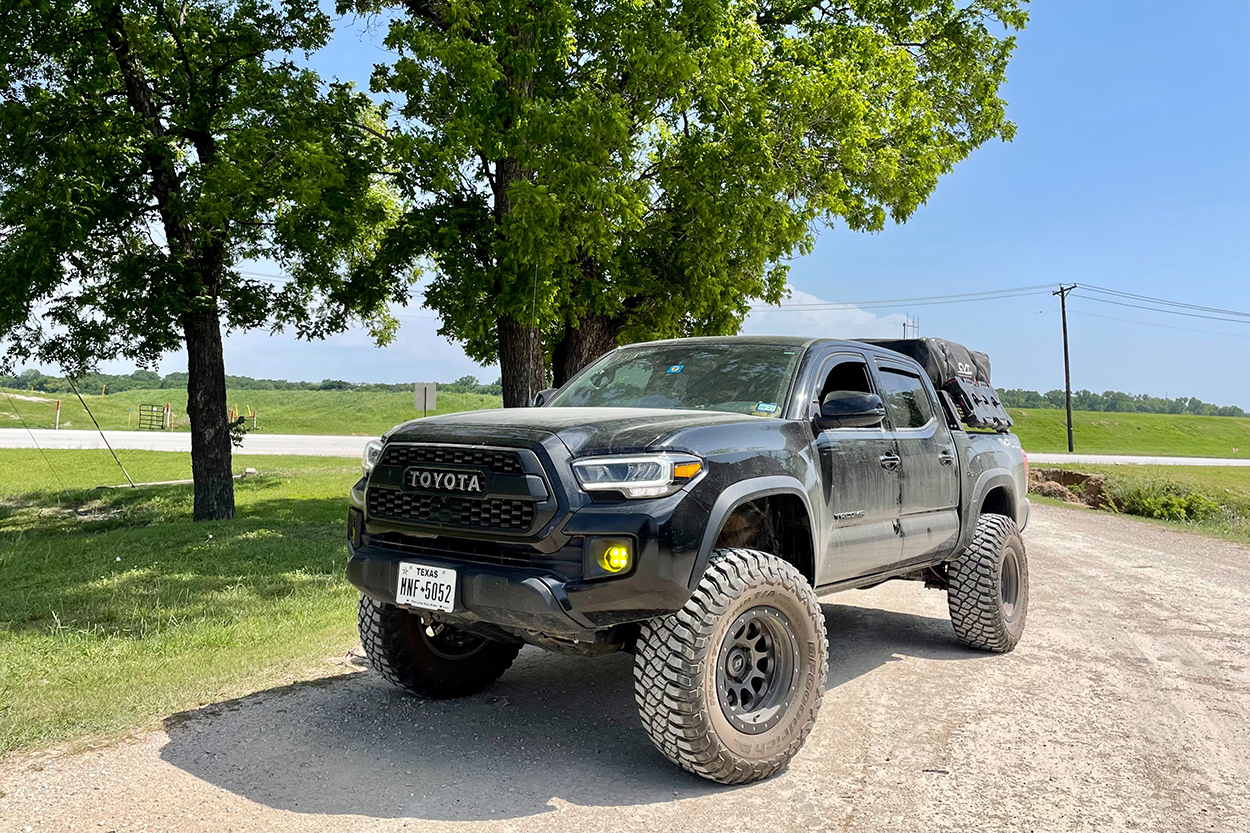 Lifted Black 3rd Gen Tacoma with SCS Ray10 Wheels & BFG KM3 Tires