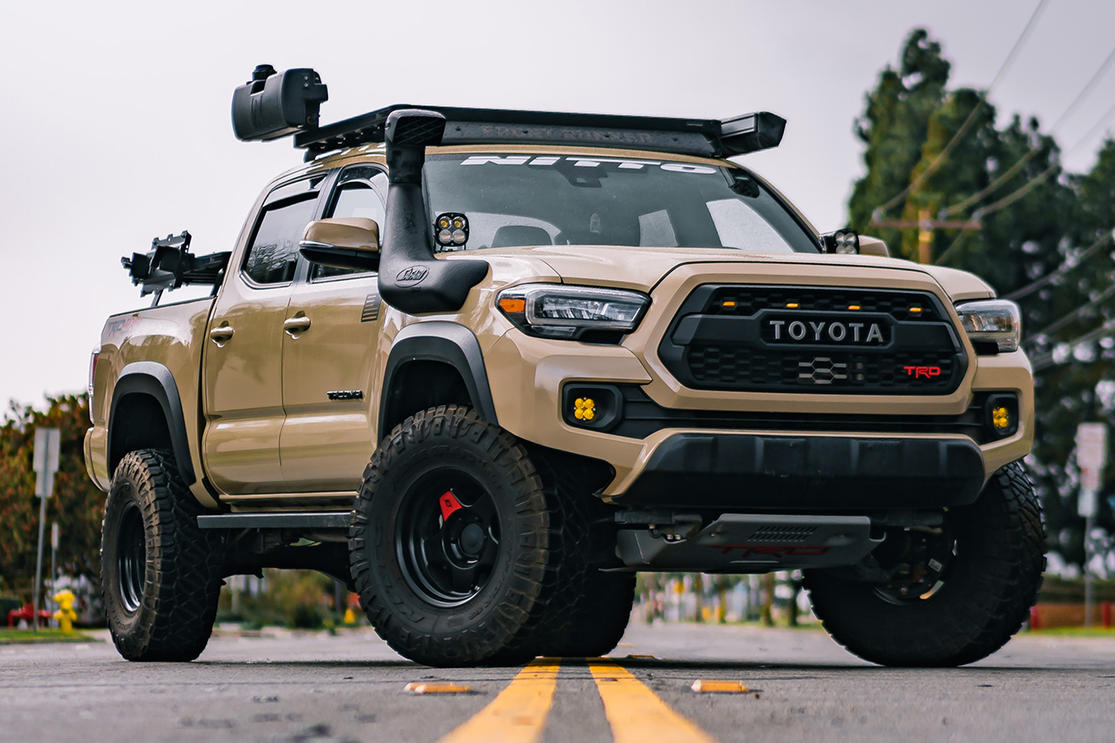 Lifted Quicksand 3rd Gen Tacoma with Front Runner Roof Rack, ARB Safari Snorkel & Black SCS F5 Wheels