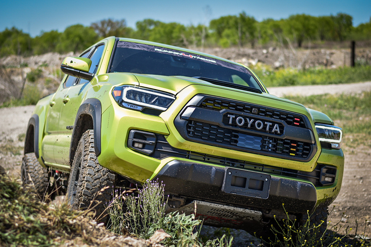 Electric Lime Tacoma with 255/85/R16 Falken Wildpeak Mts