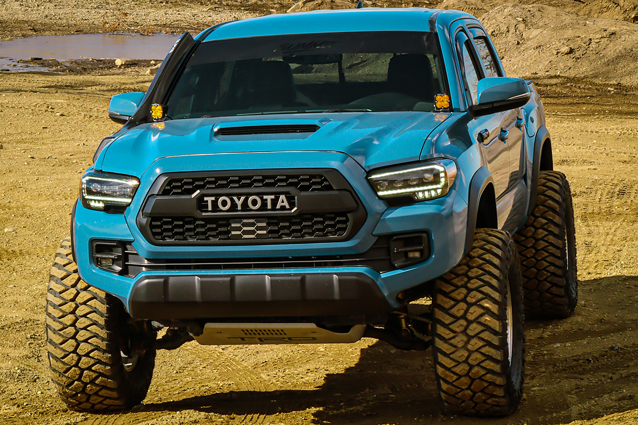 Lifted Cavalry Blue 3rd Gen Tacoma Build With AlphaRex Headlights & Snorkel